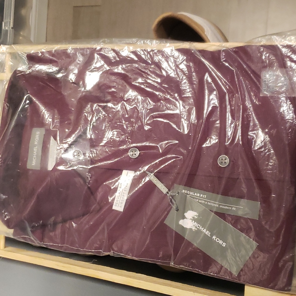 Michael Kors Long-sleeved Button down shirt.